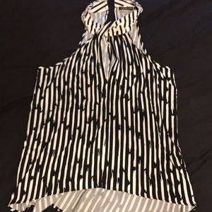 Halter type silky sleeveless top.